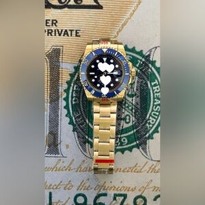 Gold Tone Diver Watch with Blue Dial and Bezel